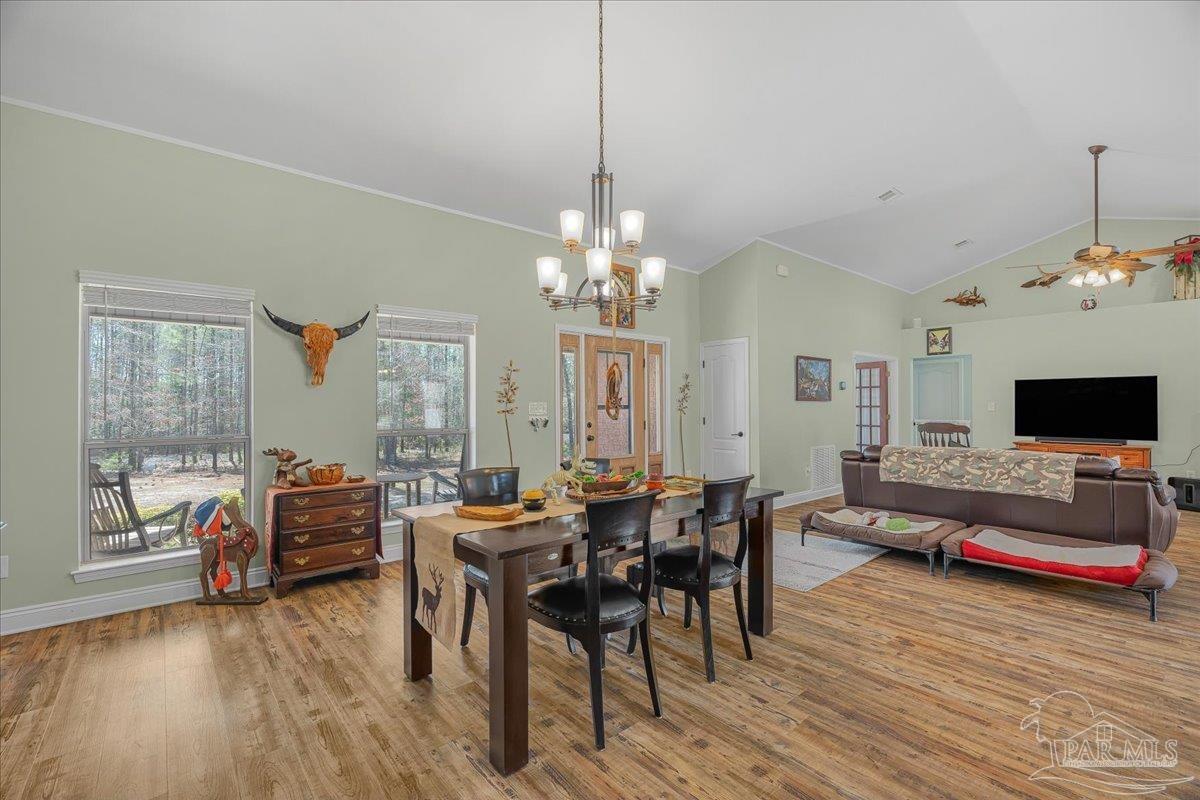1766 Narrow Road Jay, FL 32565 - Photo 21 of 55 a living room with furniture and a flat screen tv