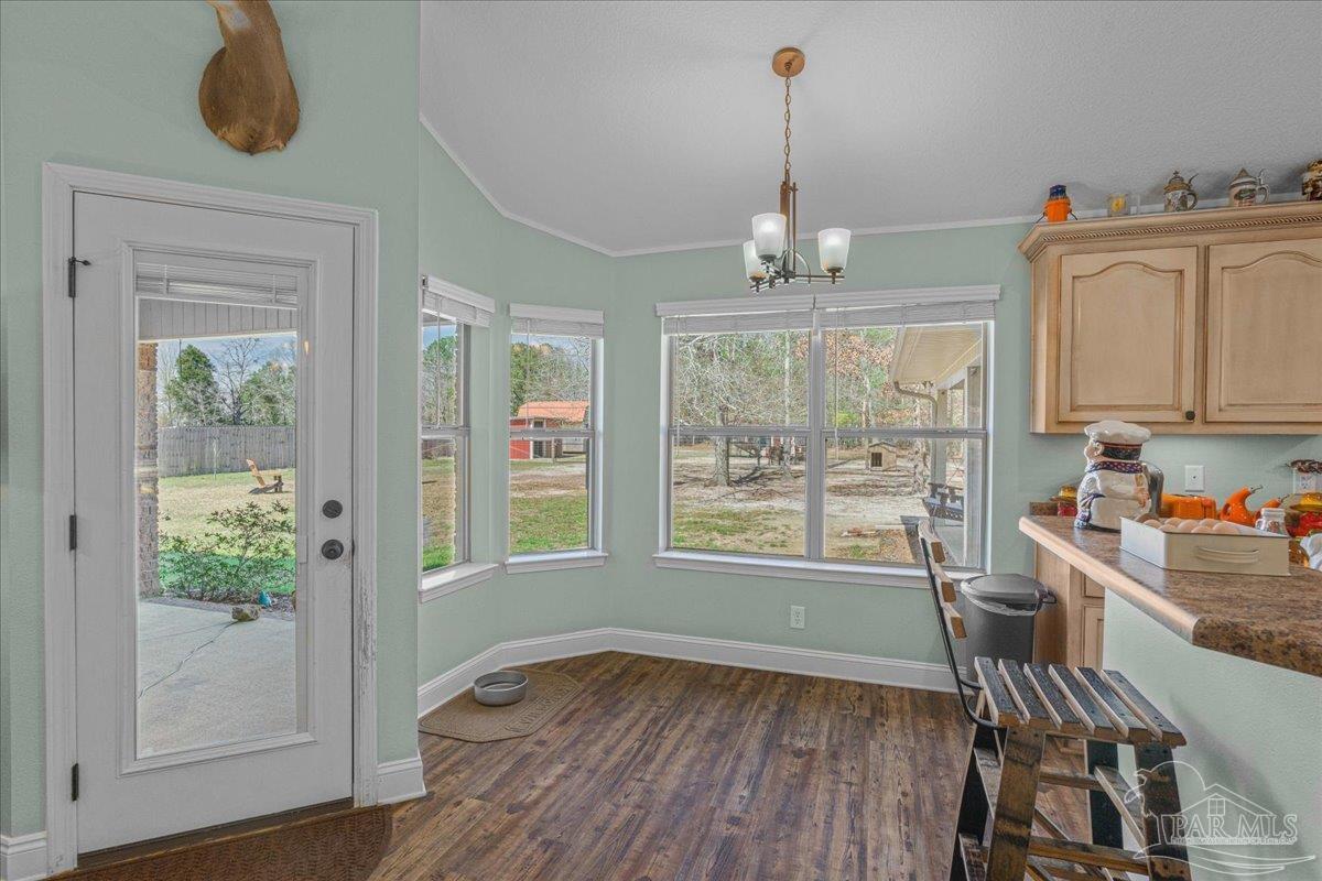 1766 Narrow Road Jay, FL 32565 - Photo 24 of 55 a workspace with wooden floor and a window
