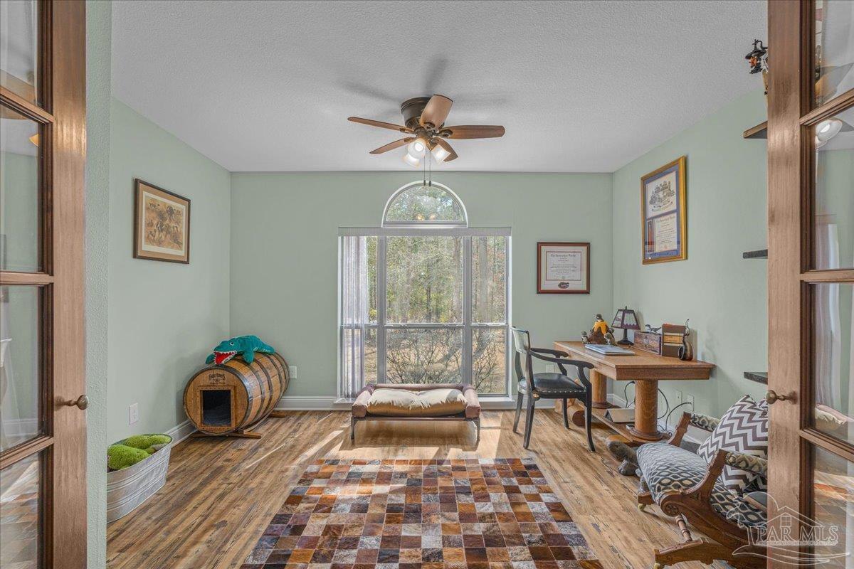 1766 Narrow Road Jay, FL 32565 - Photo 28 of 55 a living room with furniture chess table and a window