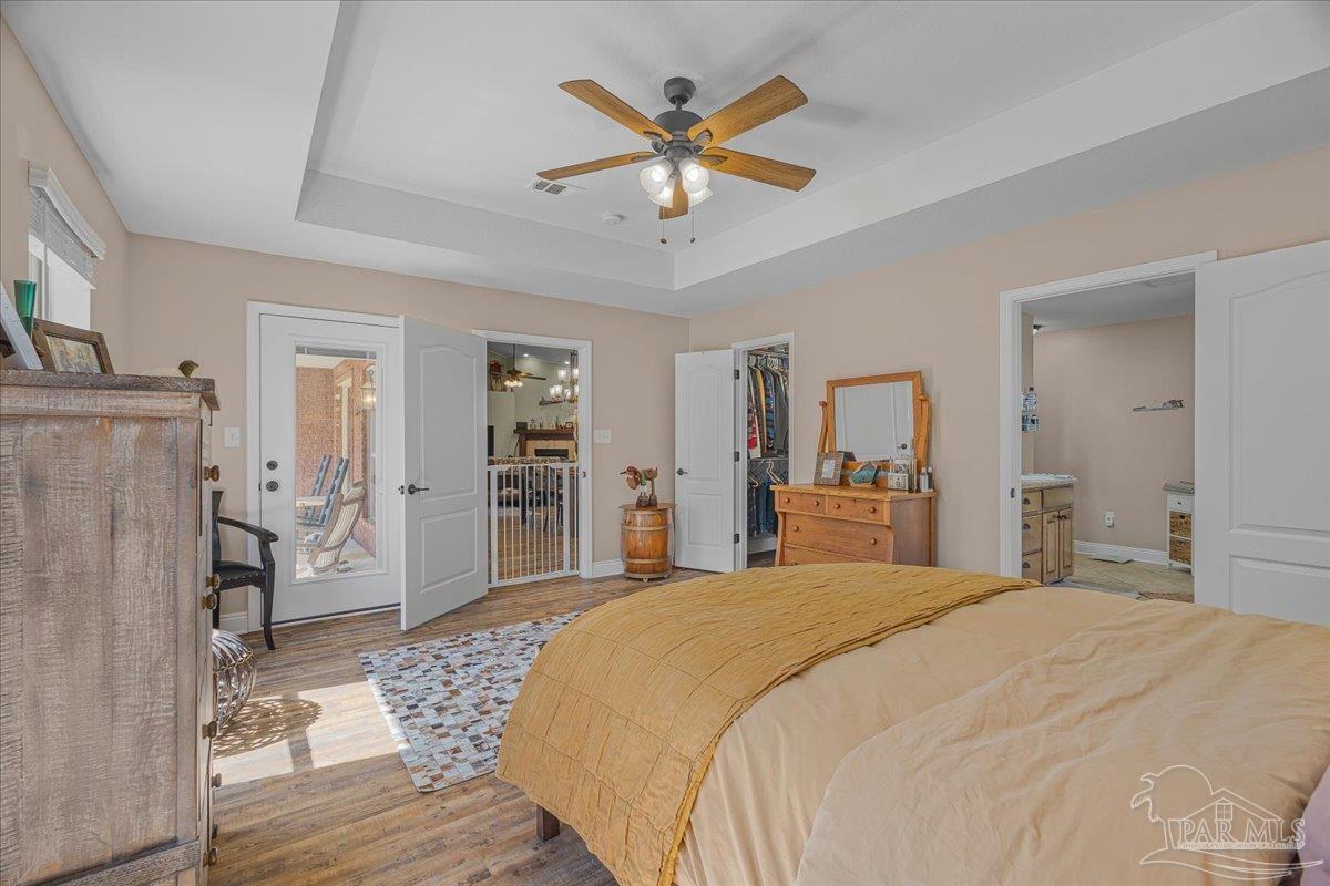 1766 Narrow Road Jay, FL 32565 - Photo 32 of 55 a bedroom with a bed and ceiling fan