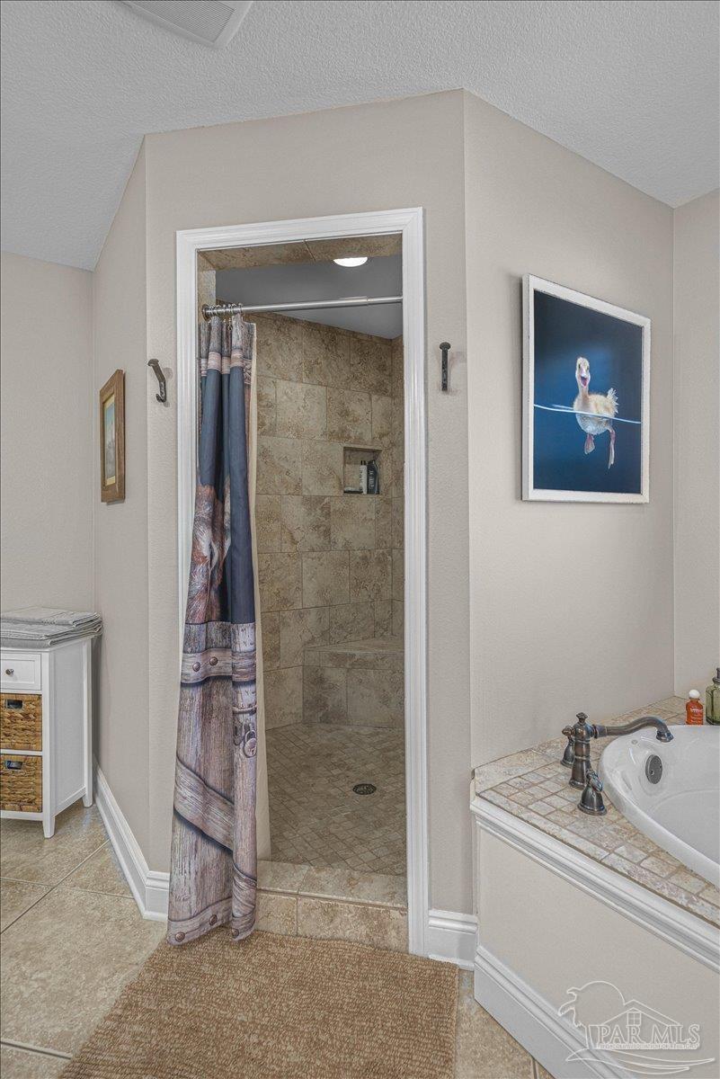 1766 Narrow Road Jay, FL 32565 - Photo 37 of 55 a bathroom with a sink a toilet and shower