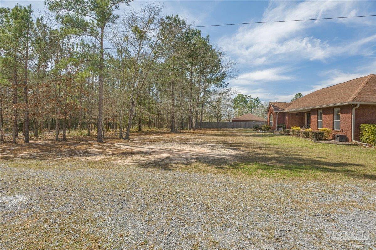 1766 Narrow Road Jay, FL 32565 - Photo 4 of 55 a view of a house with a yard