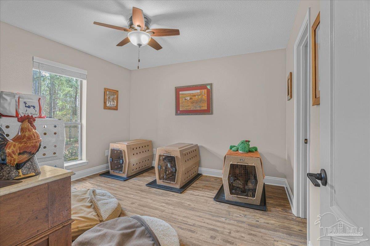 1766 Narrow Road Jay, FL 32565 - Photo 42 of 55 a living room with furniture and a fireplace