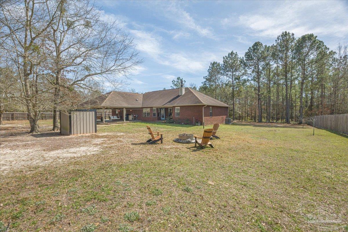 1766 Narrow Road Jay, FL 32565 - Photo 49 of 55 a swimming pool with wooden fence