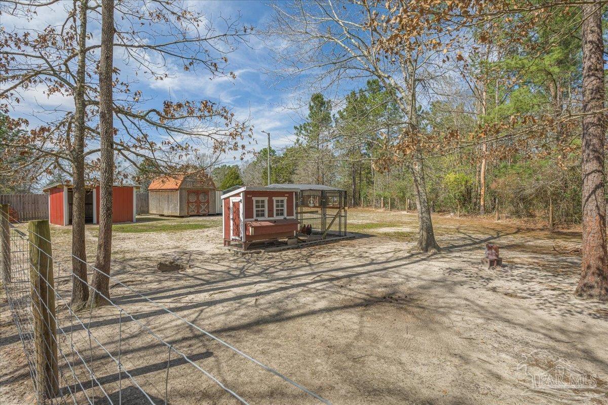 1766 Narrow Road Jay, FL 32565 - Photo 50 of 55 a view of a house with a yard