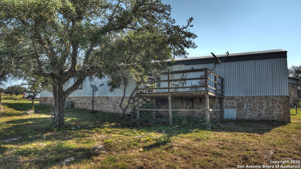 14832 Highway 41 Rocksprings, TX 78880 - Photo 2 of 21 a view of a house with a yard