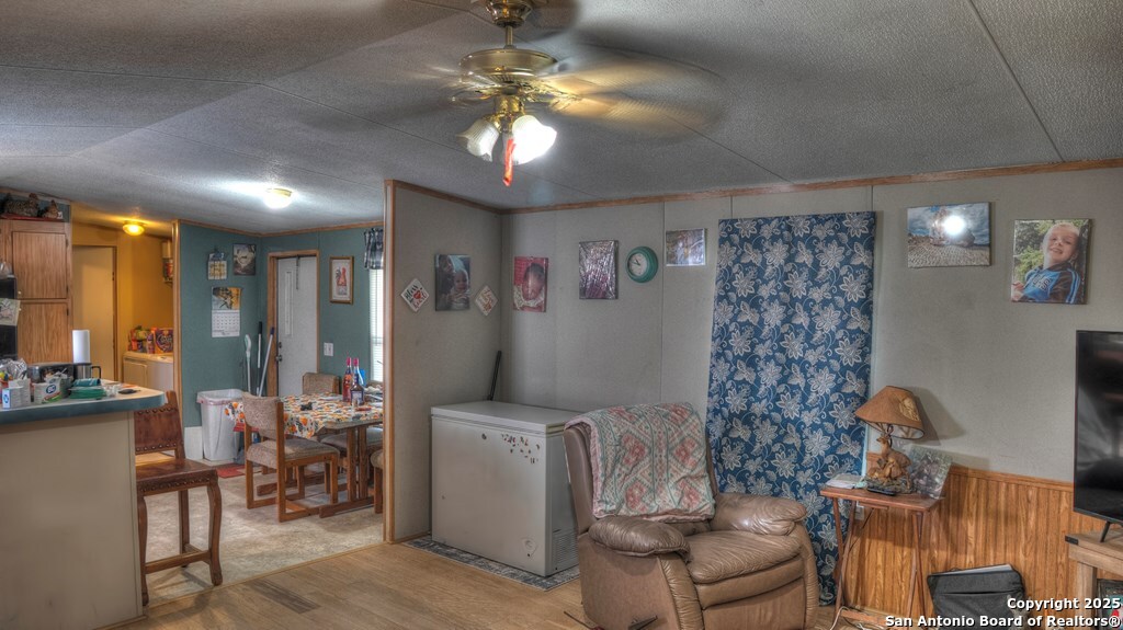 14832 Highway 41 Rocksprings, TX 78880 - Photo 3 of 21 a dining room with furniture and chandelier fan