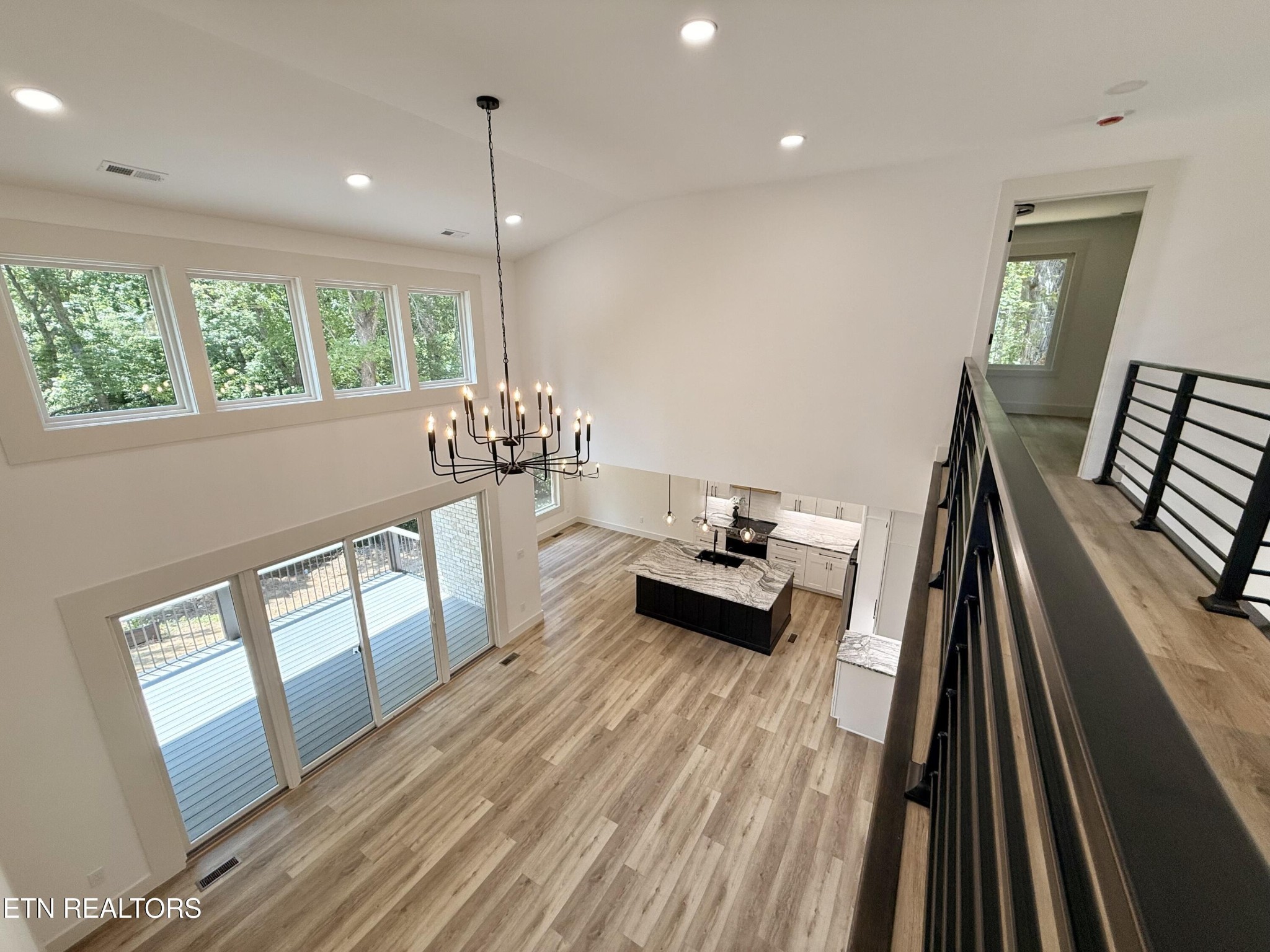 8349 Cliff Ridge Court Corryton, TN 37721 - Photo 54 of 54 a living room with furniture and a wooden floor