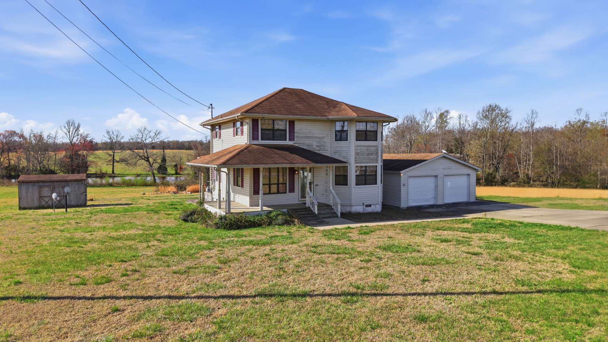 57 East Crystal Springs Road Kelso, TN 37348 - Photo 13 of 28 a front view of a house with a yard