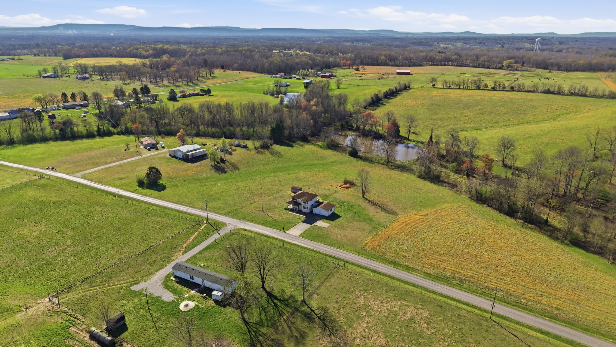 57 East Crystal Springs Road Kelso, TN 37348 - Photo 16 of 28 a view of a swimming pool with a lake view