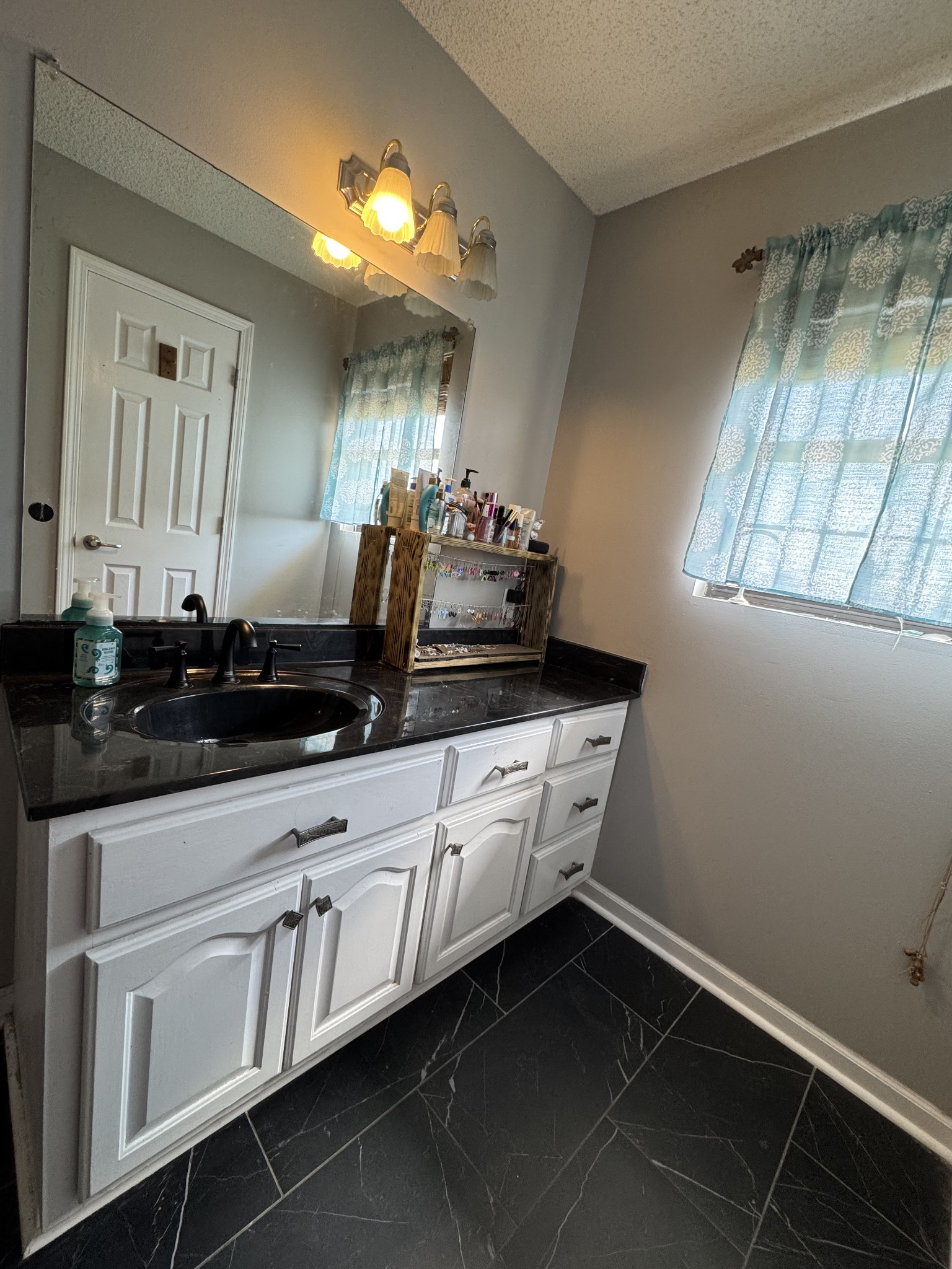 57 East Crystal Springs Road Kelso, TN 37348 - Photo 22 of 28 a close view of sink and tap