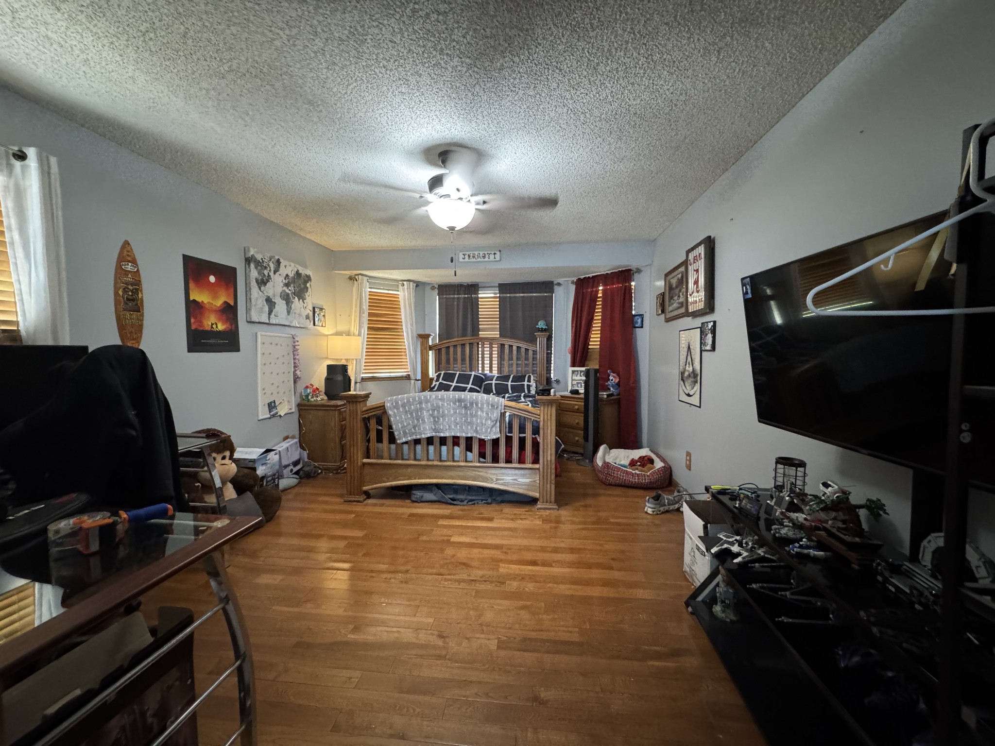 57 East Crystal Springs Road Kelso, TN 37348 - Photo 28 of 28 a living room with furniture gym equipment and a flat screen tv