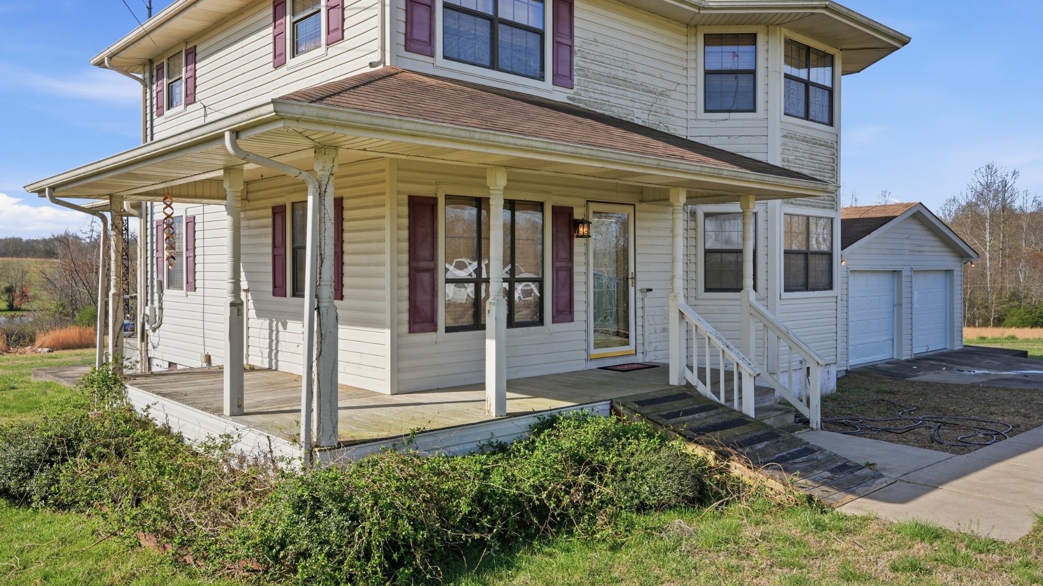 57 East Crystal Springs Road Kelso, TN 37348 - Photo 3 of 28 a view of a house with a small yard and wooden floor and fence