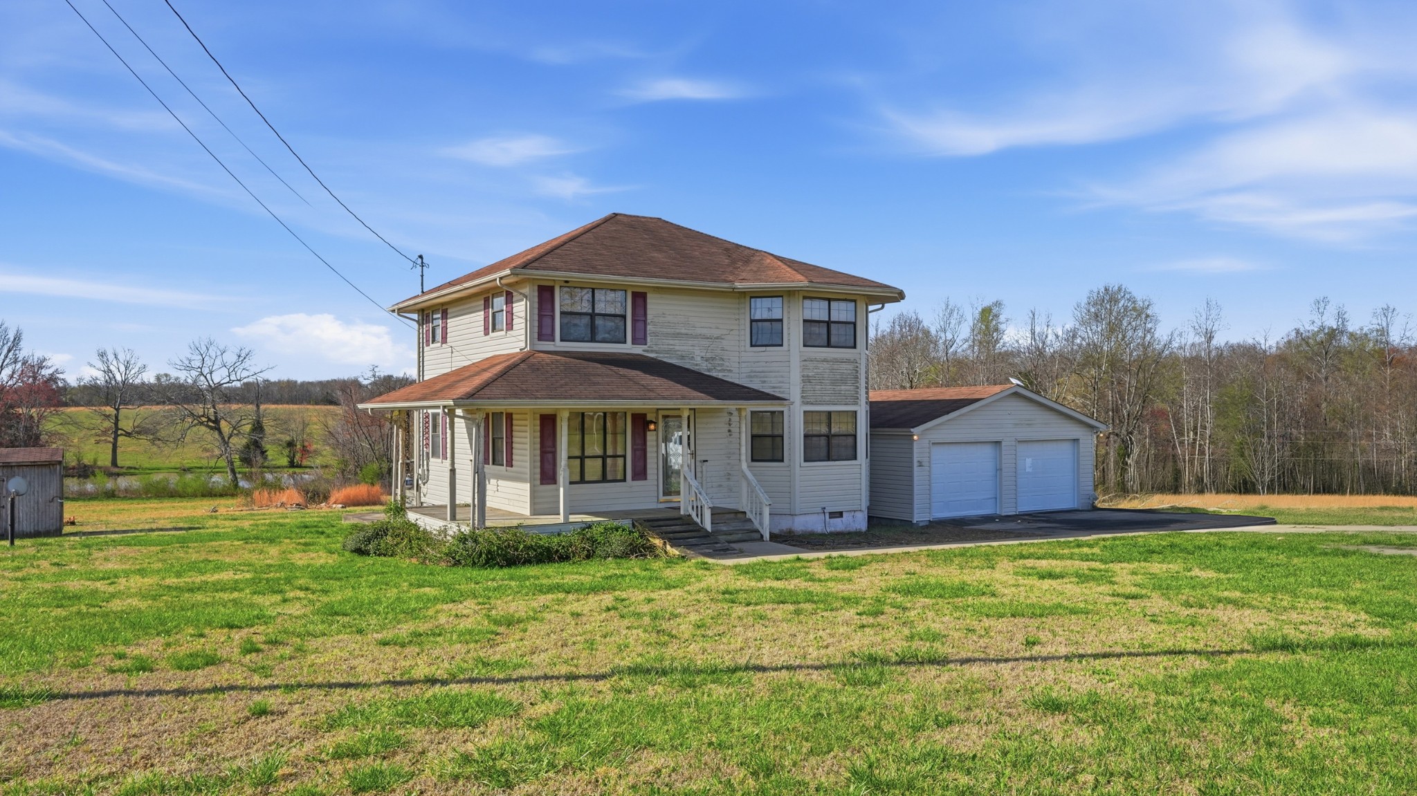 57 East Crystal Springs Road Kelso, TN 37348 - Photo 4 of 28 a front view of a house with a yard