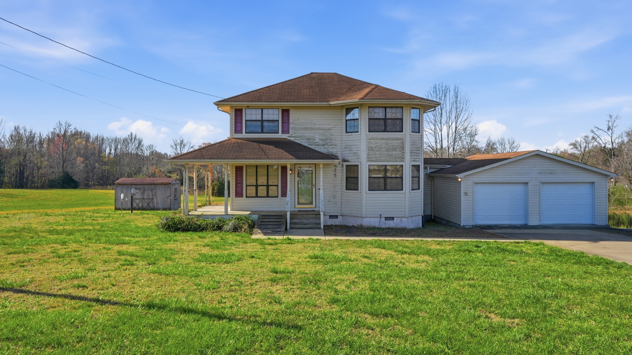 57 East Crystal Springs Road Kelso, TN 37348 - Photo 5 of 28 a front view of a house with a yard