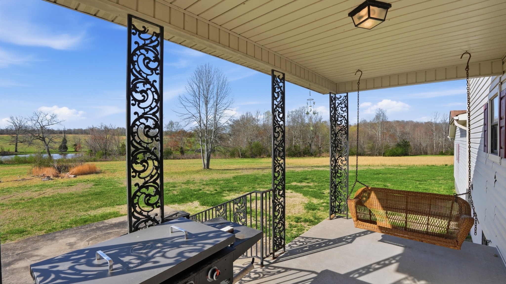 57 East Crystal Springs Road Kelso, TN 37348 - Photo 7 of 28 a view of a porch with furniture and garden