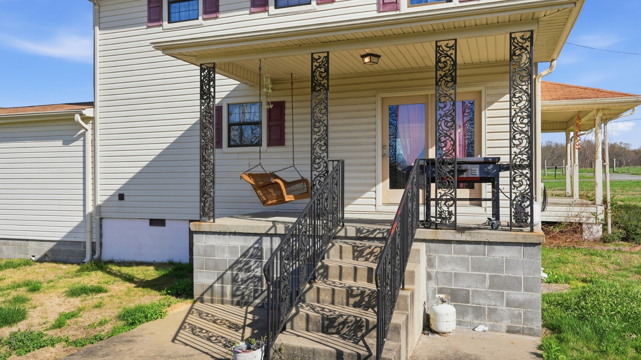57 East Crystal Springs Road Kelso, TN 37348 - Photo 8 of 28 a front view of a house with outdoor seating