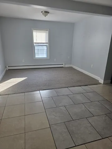a view of a livingroom with a window