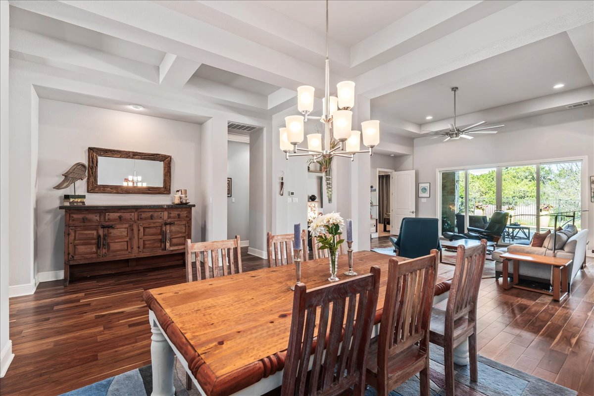413 Montalcino Lane Georgetown, TX 78628 - Photo 12 of 40 a view of a dining room with furniture window and wooden floor