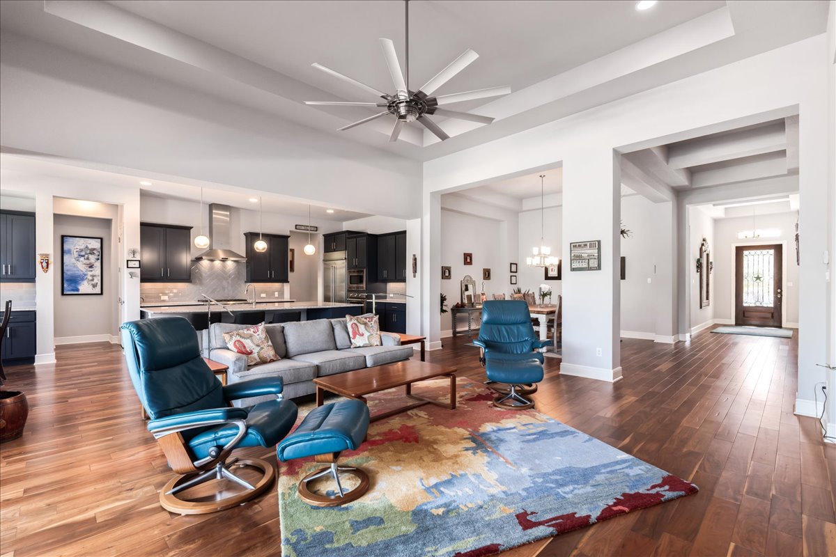 413 Montalcino Lane Georgetown, TX 78628 - Photo 18 of 40 a living room with furniture and wooden floor