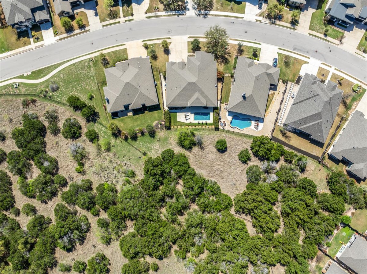 413 Montalcino Lane Georgetown, TX 78628 - Photo 2 of 40 an aerial view of residential house with outdoor space and swimming pool