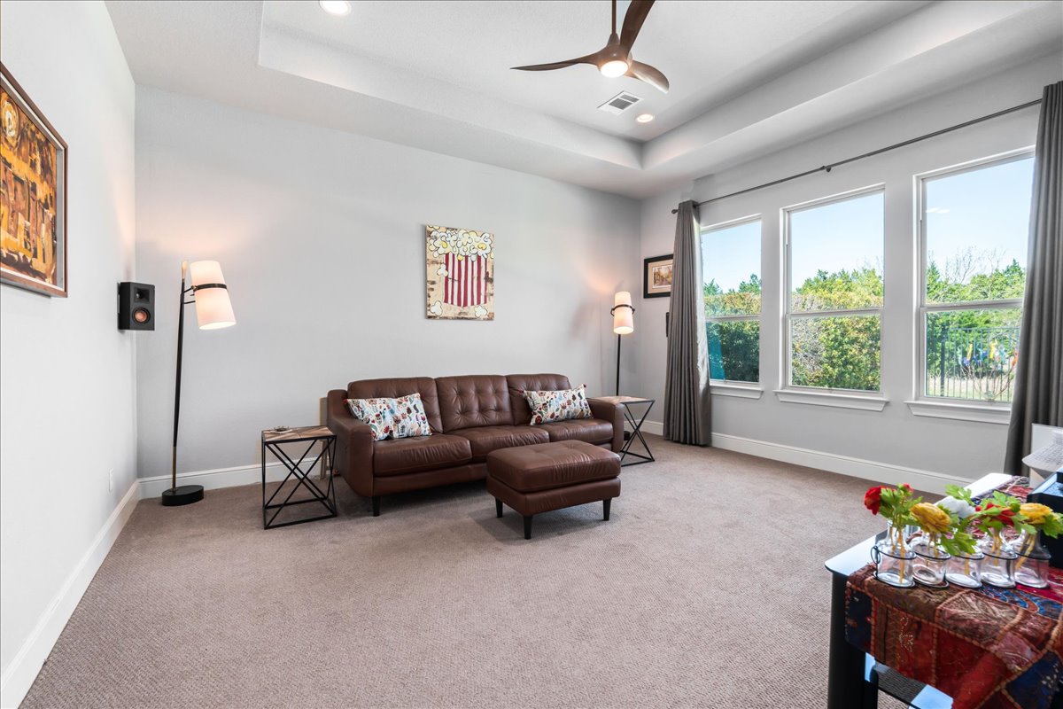 413 Montalcino Lane Georgetown, TX 78628 - Photo 26 of 40 a living room with furniture and a large window