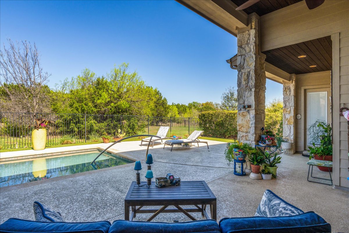 413 Montalcino Lane Georgetown, TX 78628 - Photo 34 of 40 a view of a terrace with couches and potted plants