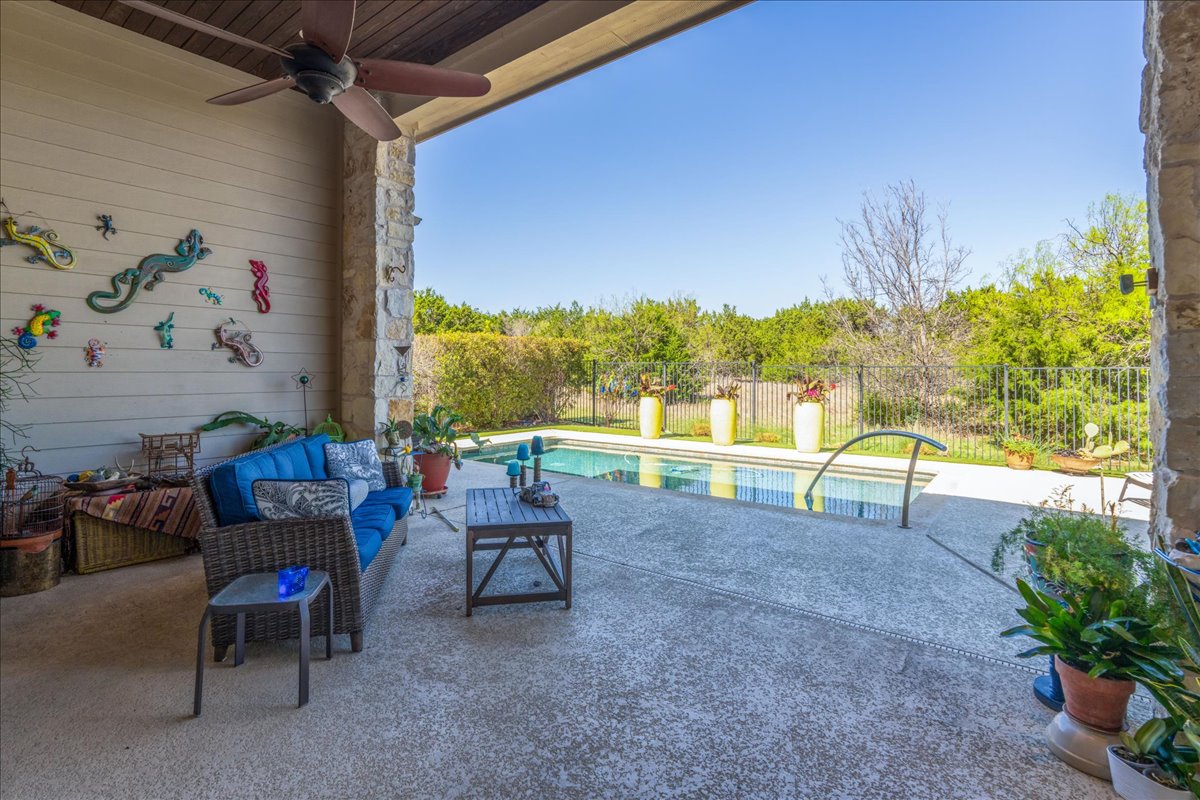 413 Montalcino Lane Georgetown, TX 78628 - Photo 35 of 40 a view of a backyard with a patio and a garden