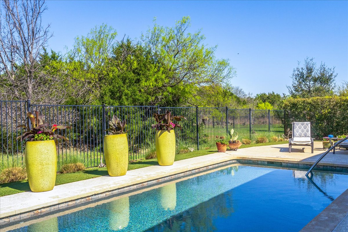 413 Montalcino Lane Georgetown, TX 78628 - Photo 40 of 40 a view of a swimming pool with lounge chairs