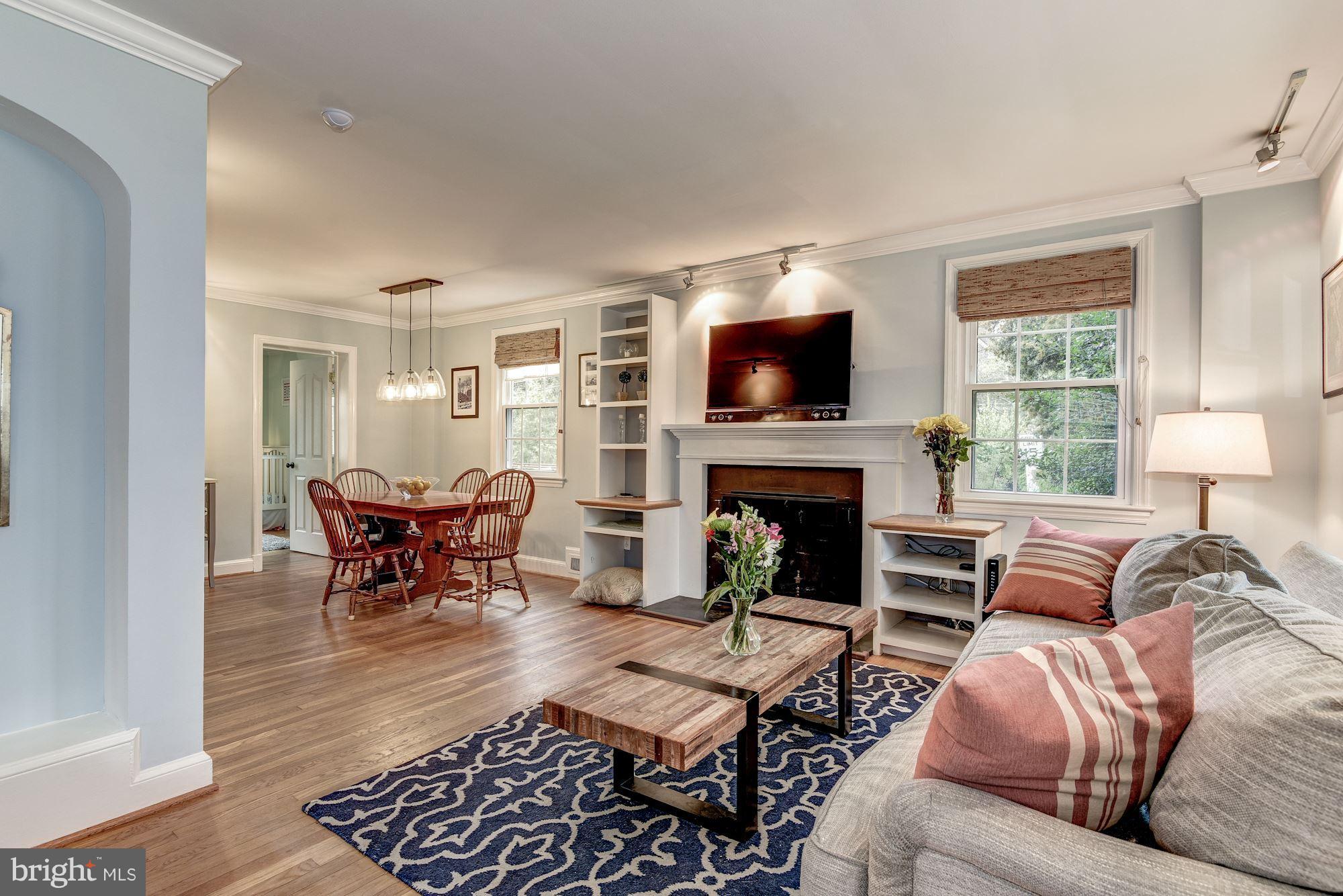 4636 Q Street Northwest Washington, DC 20007 - Photo 2 of 20 Living Room with wood burning fireplace