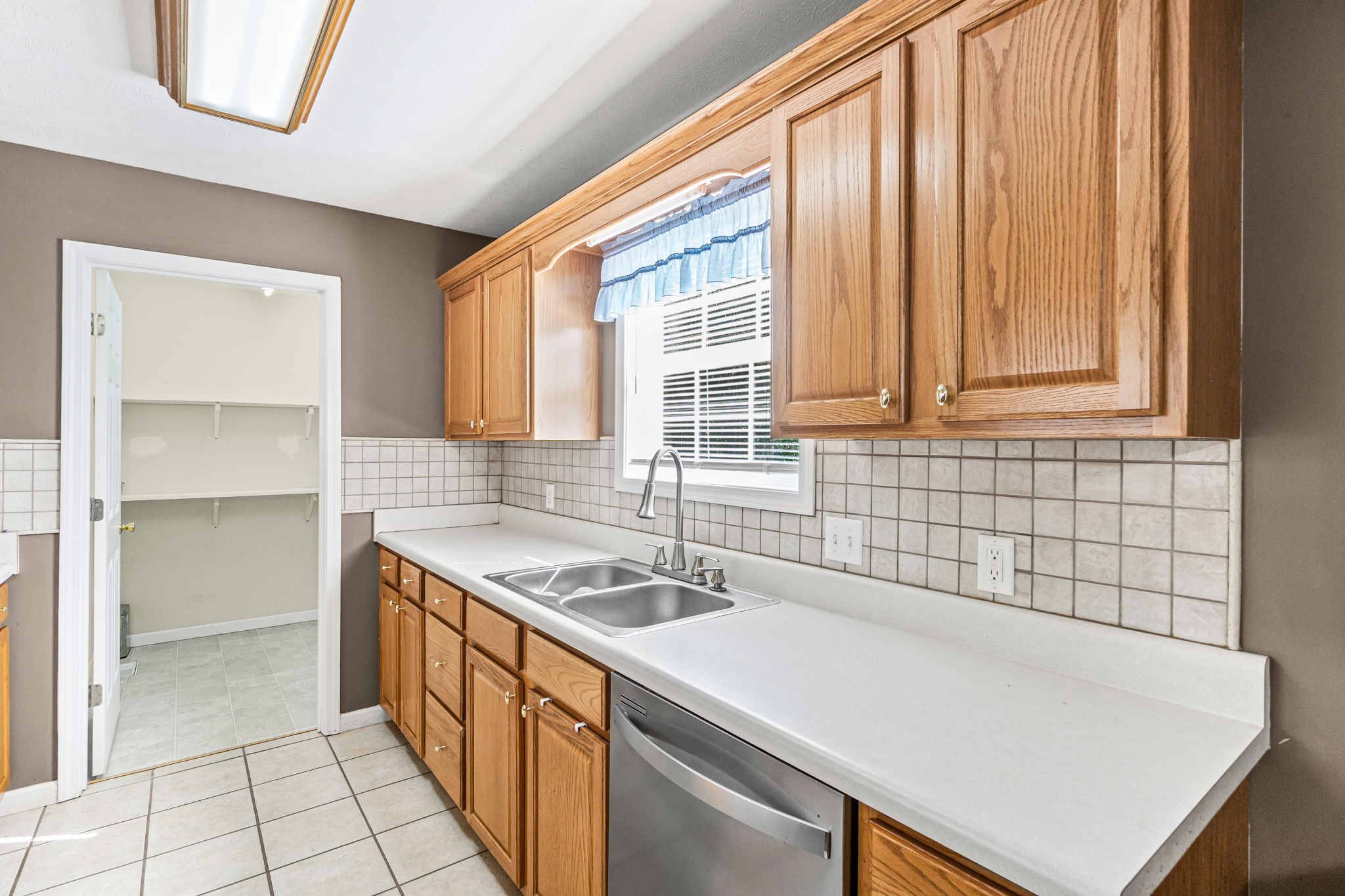 291 Poplar Point Lane Rickman, TN 38580 - Photo 13 of 34 a kitchen that has a sink and a stove in it