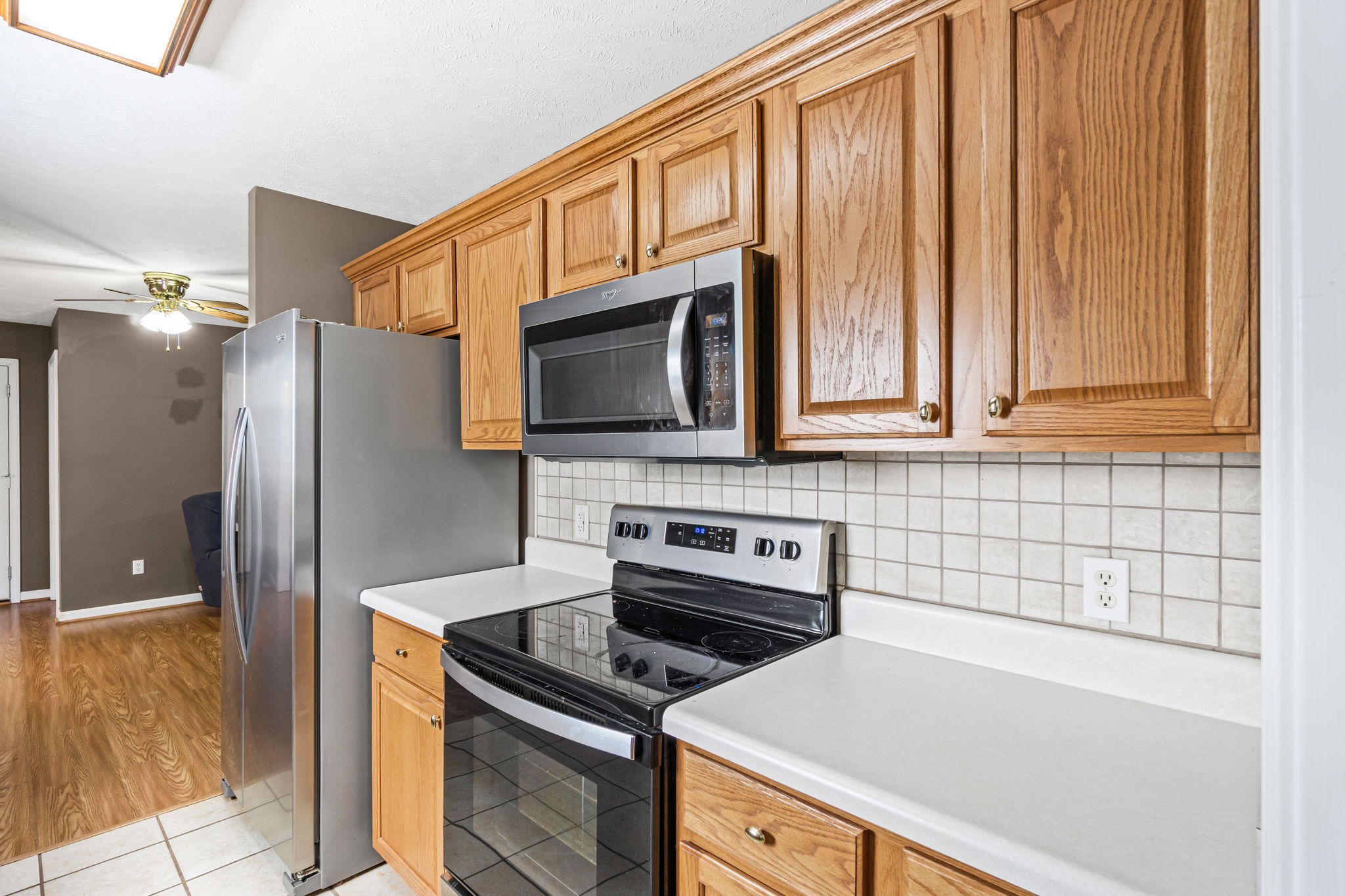 291 Poplar Point Lane Rickman, TN 38580 - Photo 14 of 34 a kitchen with a stove microwave and refrigerator