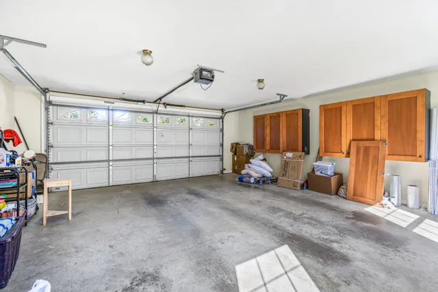 a view of a livingroom with window and furniture