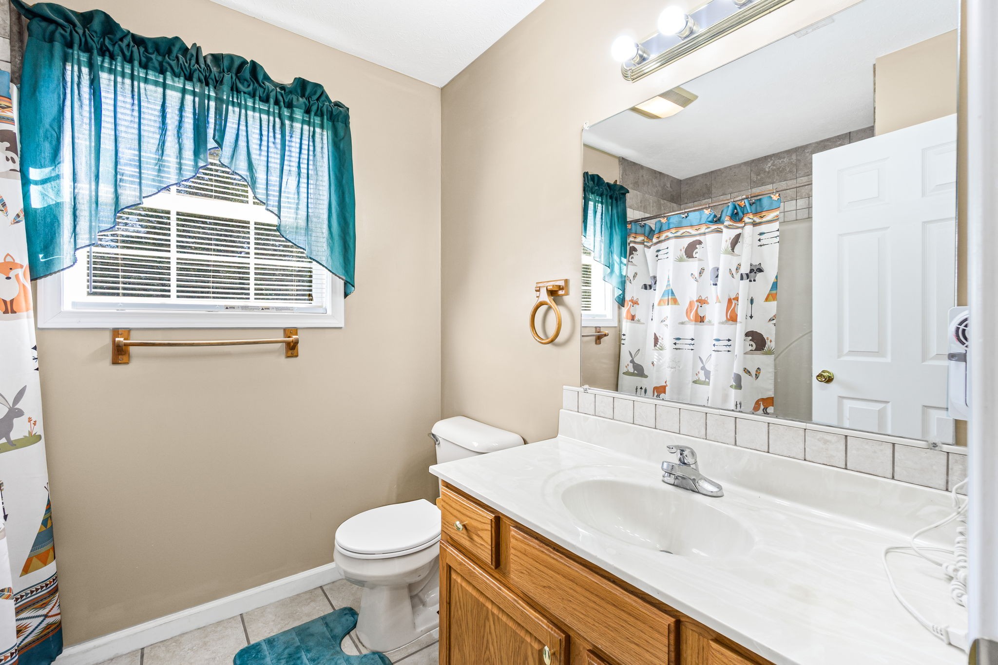 291 Poplar Point Lane Rickman, TN 38580 - Photo 27 of 34 a bathroom with a sink toilet and shower