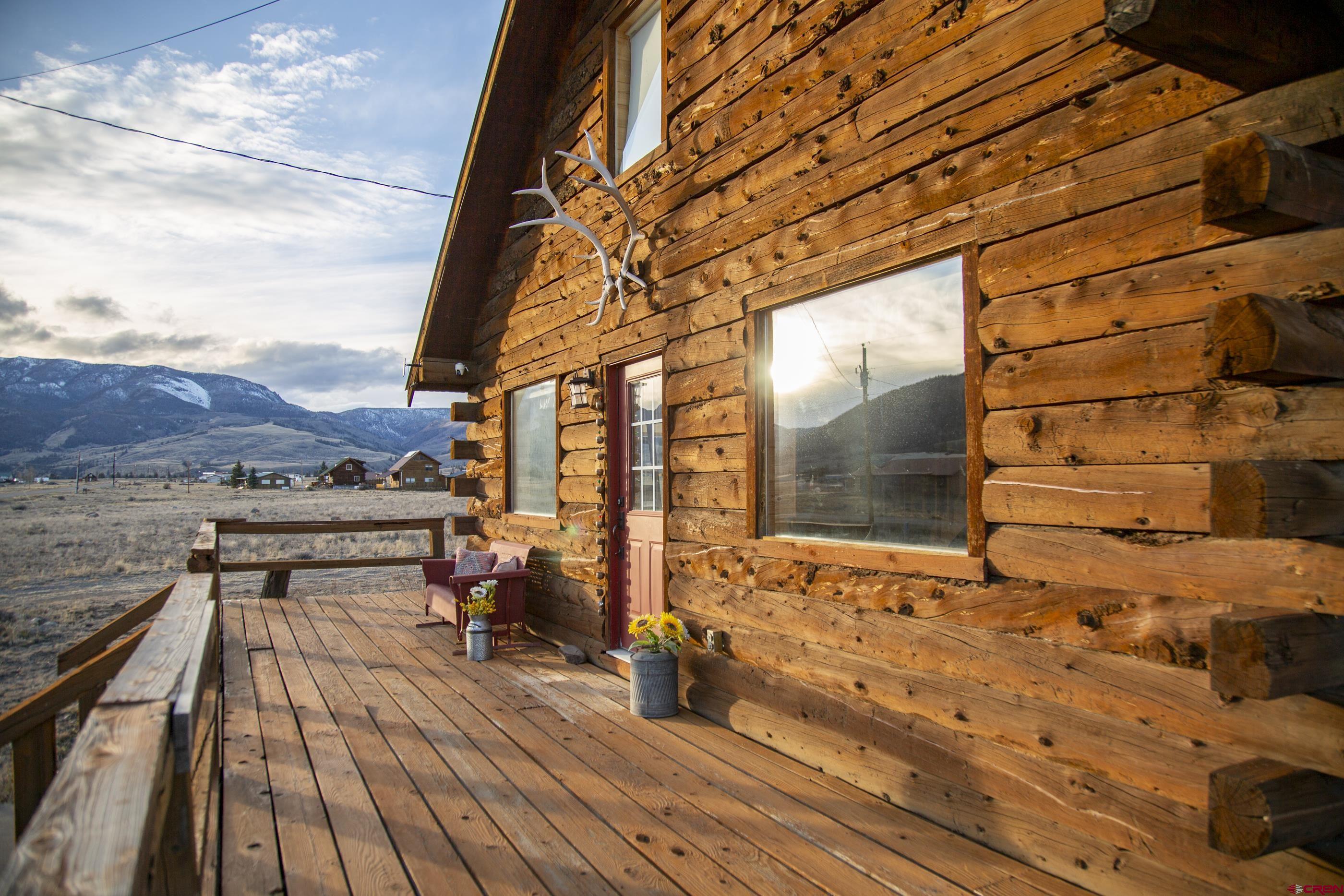 415 Ridge Drive Creede, CO 81130 - Photo 20 of 28 a view of balcony with wooden floor and fence