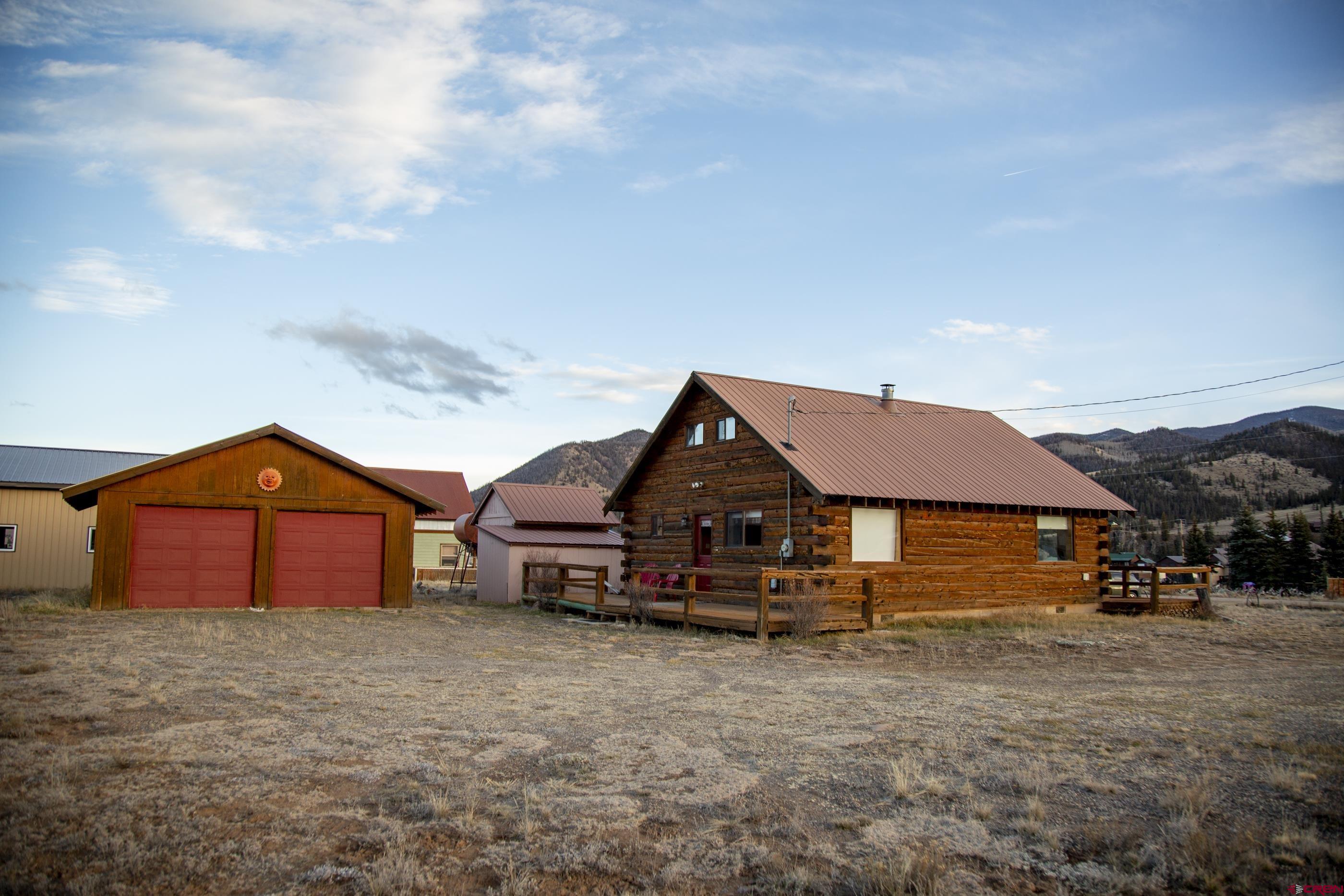 415 Ridge Drive Creede, CO 81130 - Photo 28 of 28 a yellow and red house with a outdoor space