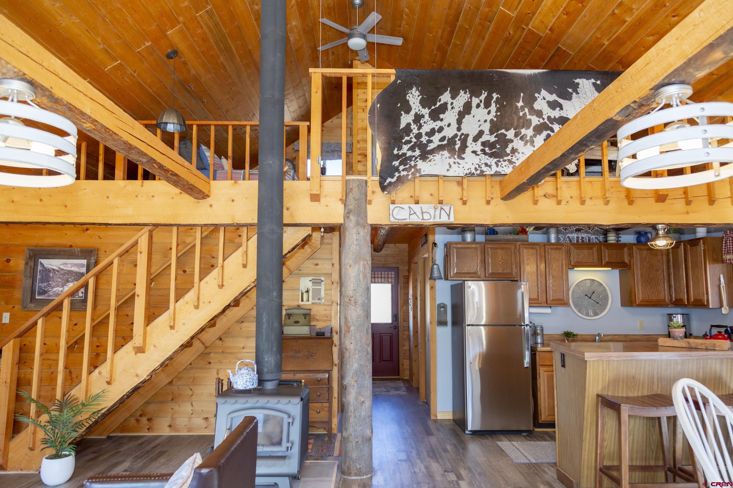 415 Ridge Drive Creede, CO 81130 - Photo 8 of 28 a front view of a building with seating space