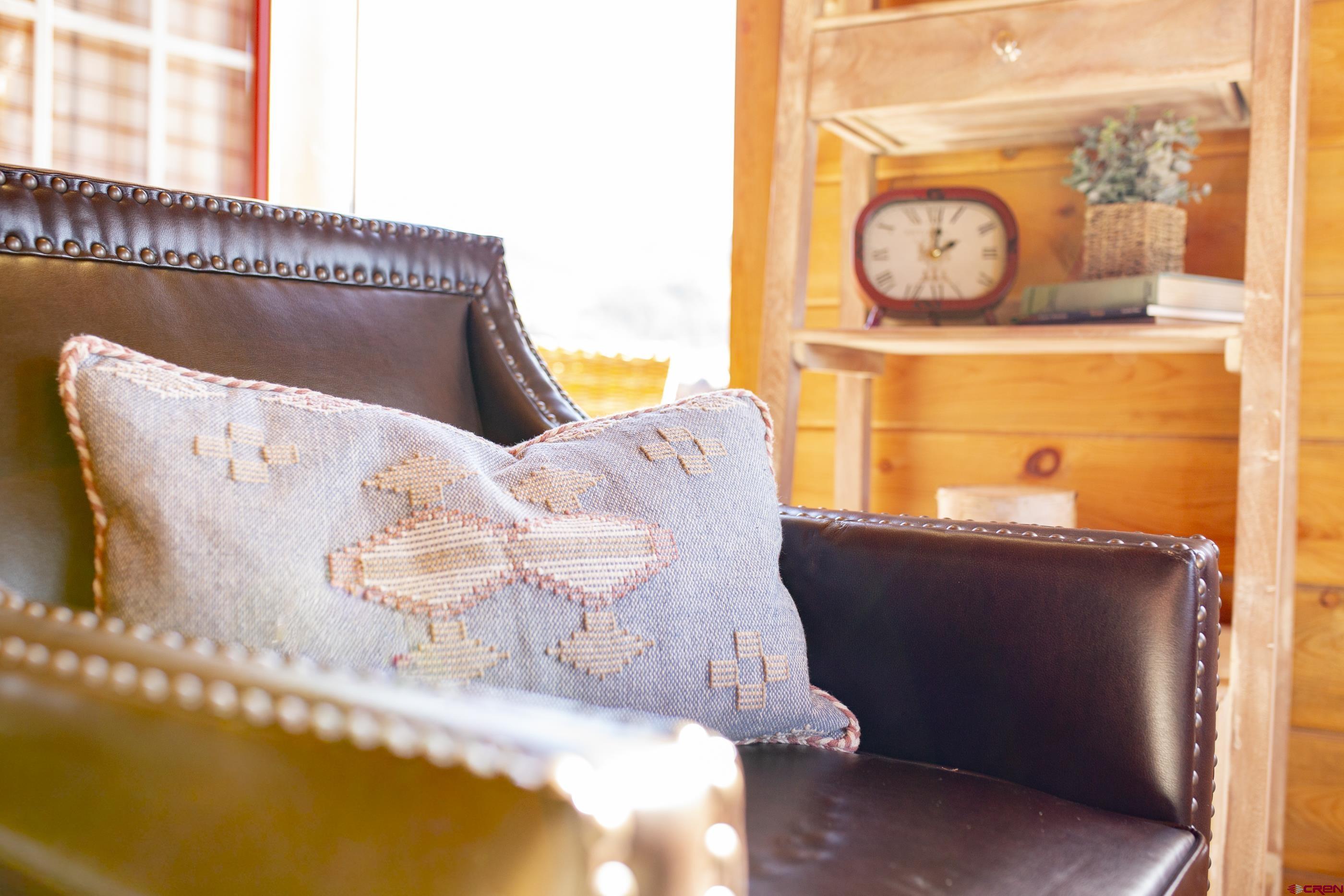 415 Ridge Drive Creede, CO 81130 - Photo 10 of 28 a living room with a bed