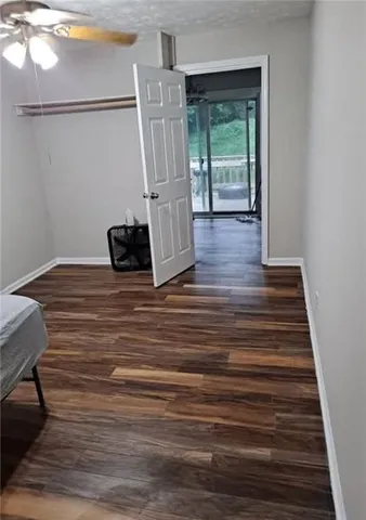 a view of entryway with wooden floor