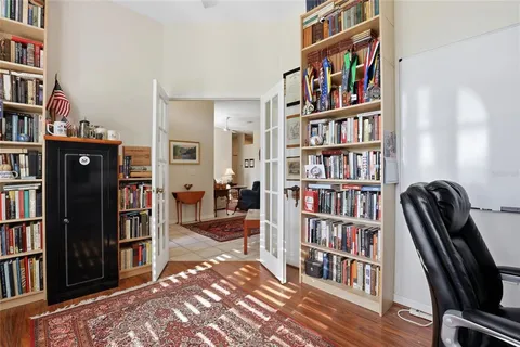 a view of a livingroom with a bookshelf