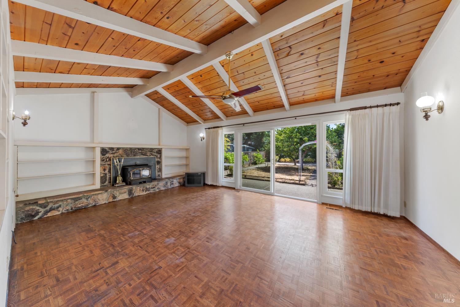 32 Roosevelt Avenue San Rafael, CA 94903 - Photo 19 of 40 a view of an empty room with wooden floor and a window