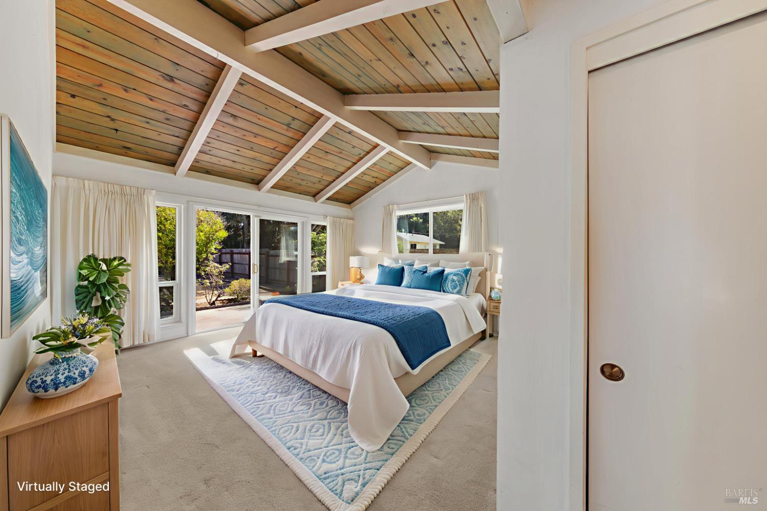 32 Roosevelt Avenue San Rafael, CA 94903 - Photo 20 of 40 a bed sitting in a spacious bedroom next to a window