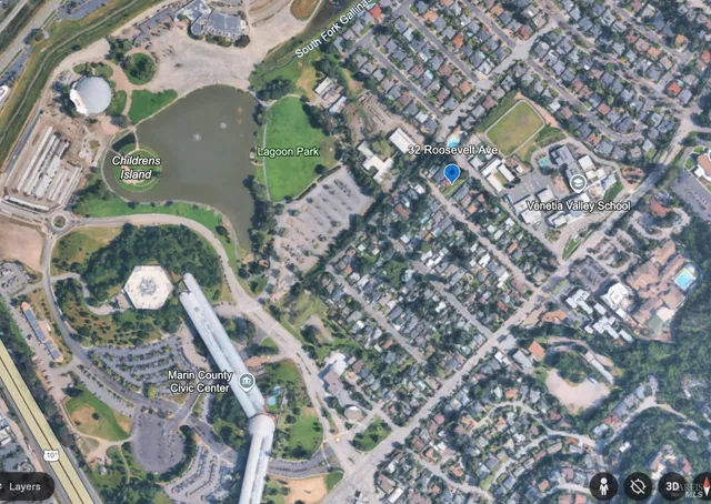 a view of a chairs and table in the backyard