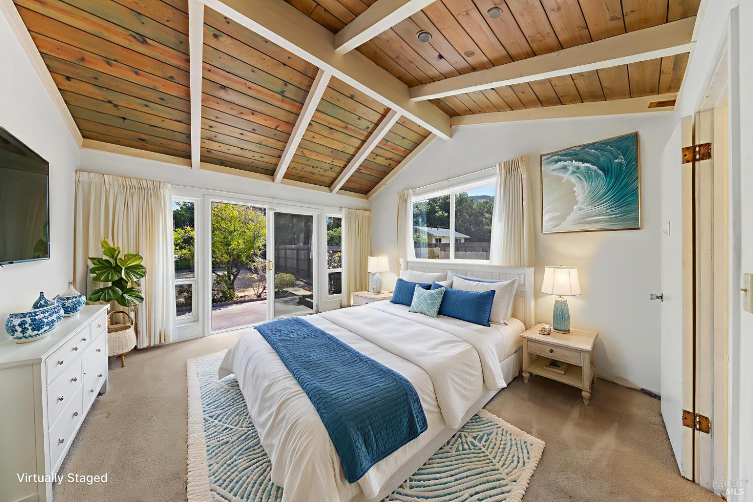 32 Roosevelt Avenue San Rafael, CA 94903 - Photo 22 of 40 a bedroom with a large bed and a balcony