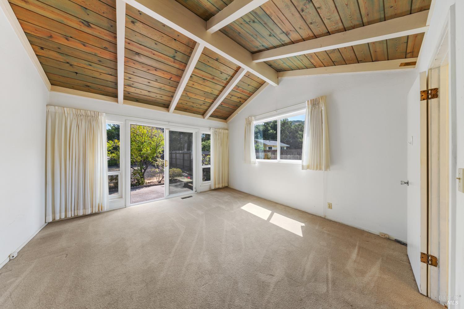 32 Roosevelt Avenue San Rafael, CA 94903 - Photo 23 of 40 a view of a porch with chairs and floor to ceiling window