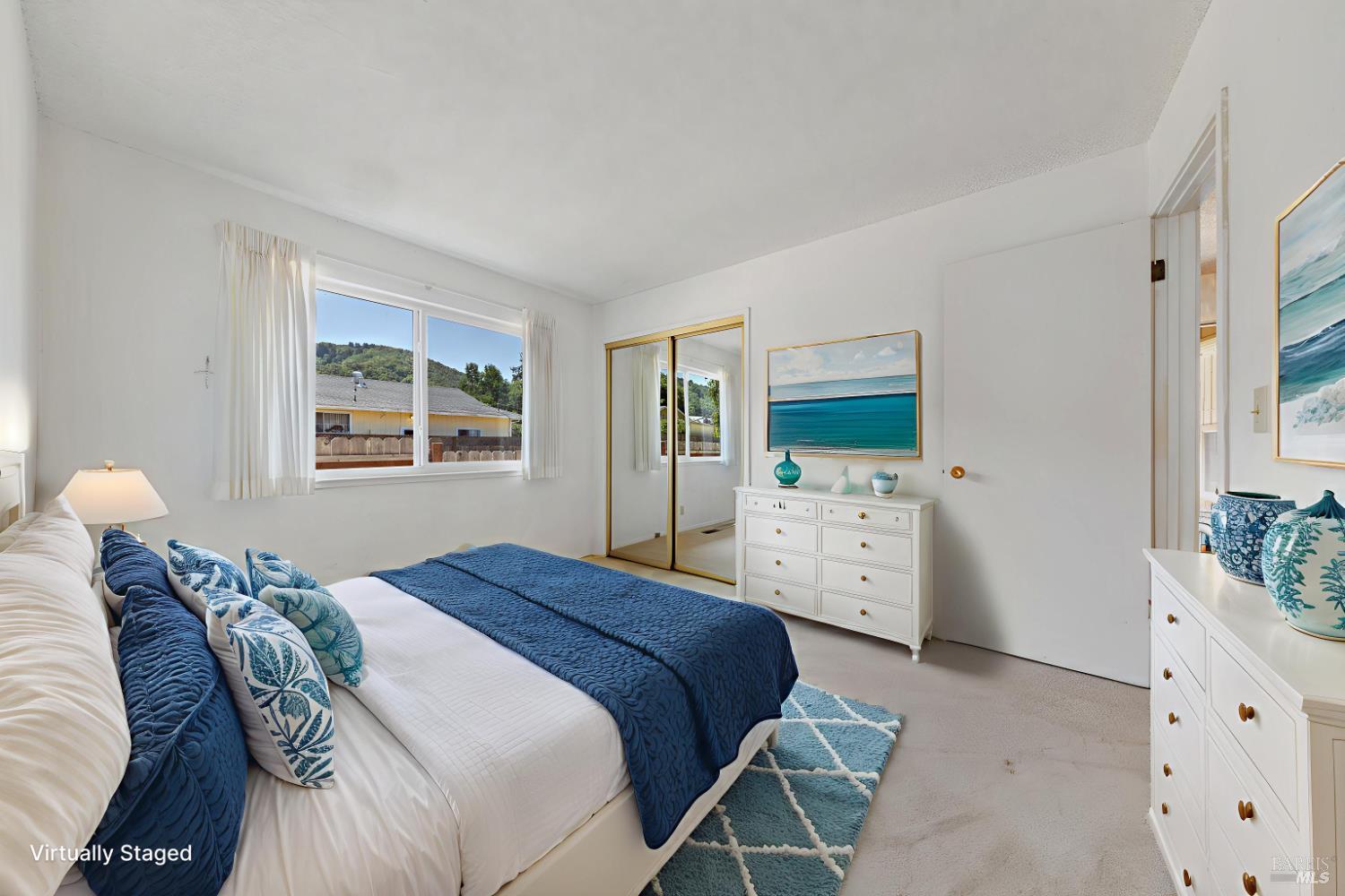 32 Roosevelt Avenue San Rafael, CA 94903 - Photo 24 of 40 a bedroom with a bed and a flat screen tv