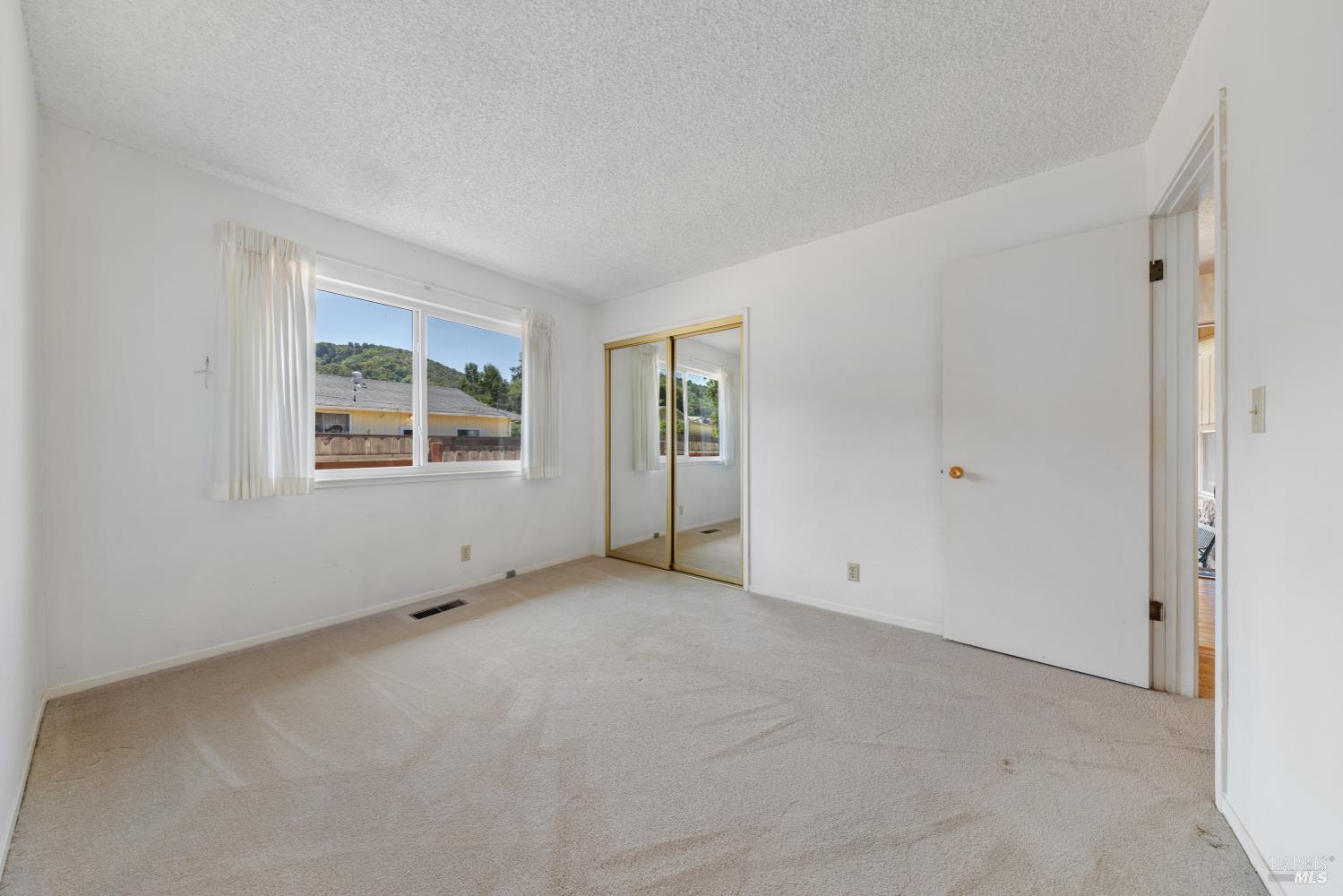 32 Roosevelt Avenue San Rafael, CA 94903 - Photo 25 of 40 an empty room with windows
