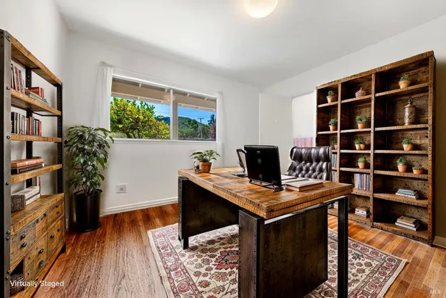 a view of a street with a building