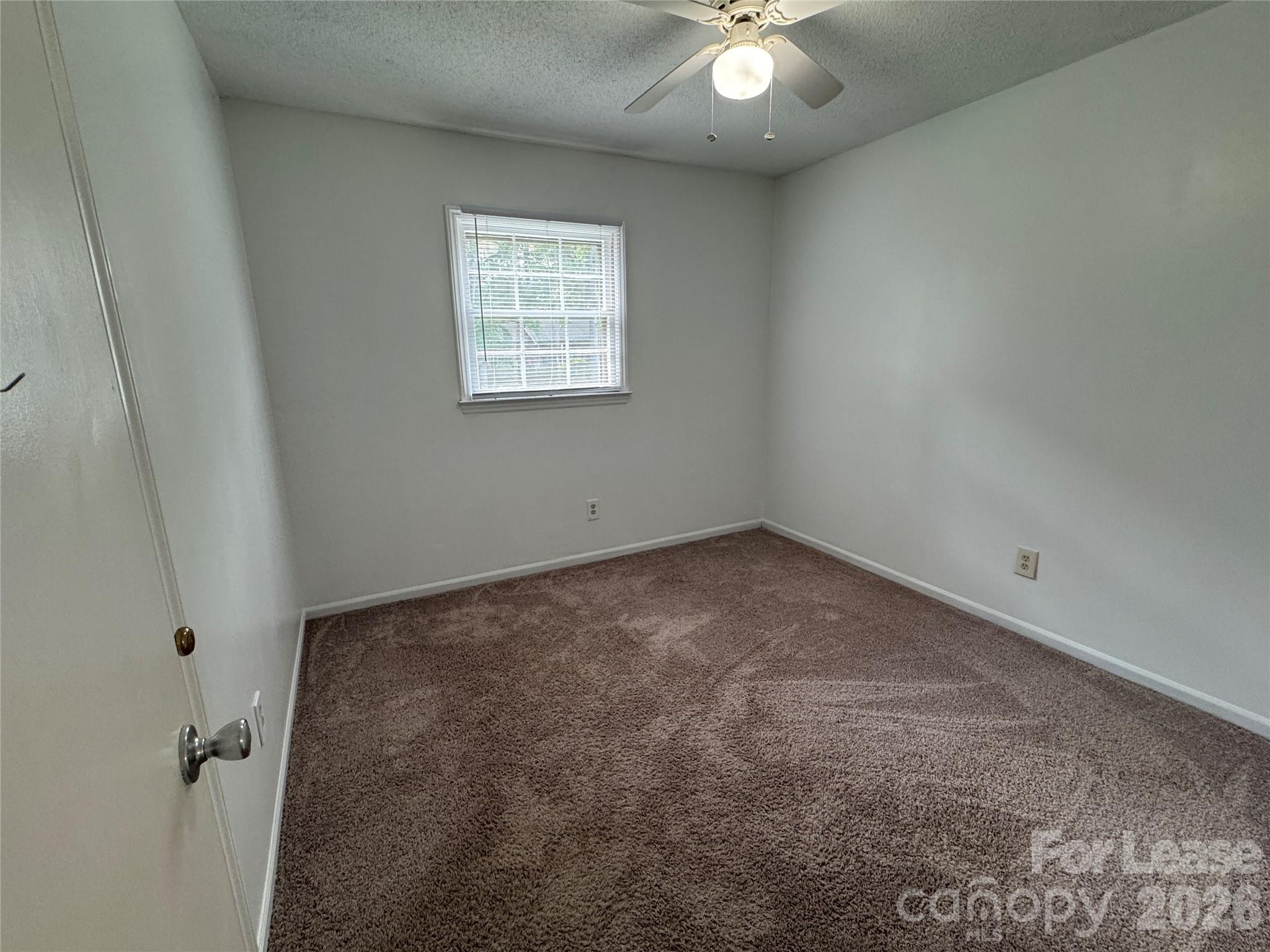 315 Pine Road Mount Holly, NC 28120 - Photo 13 of 21 an empty room with a window