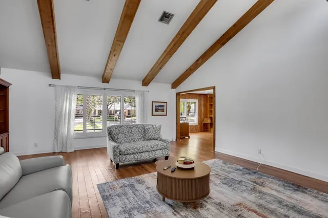 a kitchen with a table and chairs in it